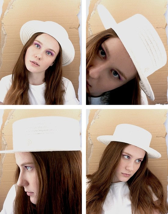 Kiki - canotier en paille cousue .