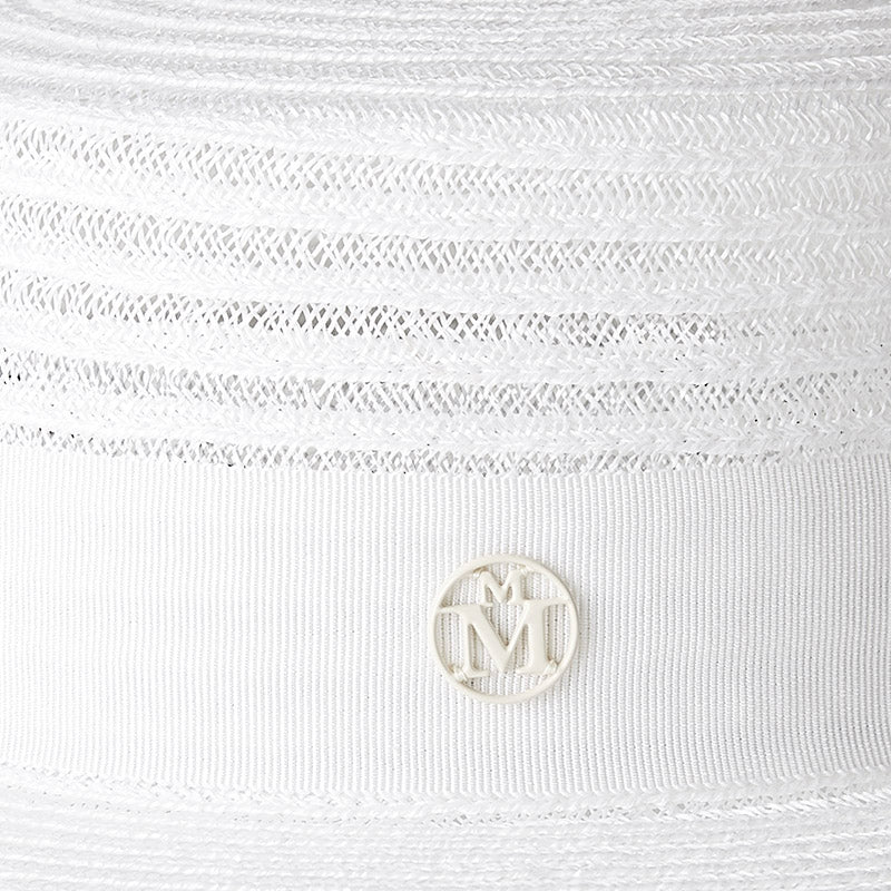 Kiki - canotier en paille cousue .