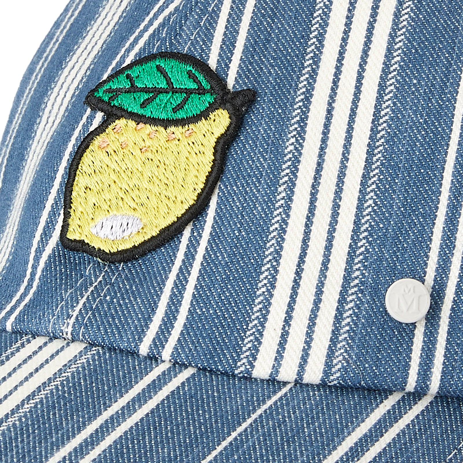 Tiger - Casquette en tissu rayé type denim avec un patch citron.