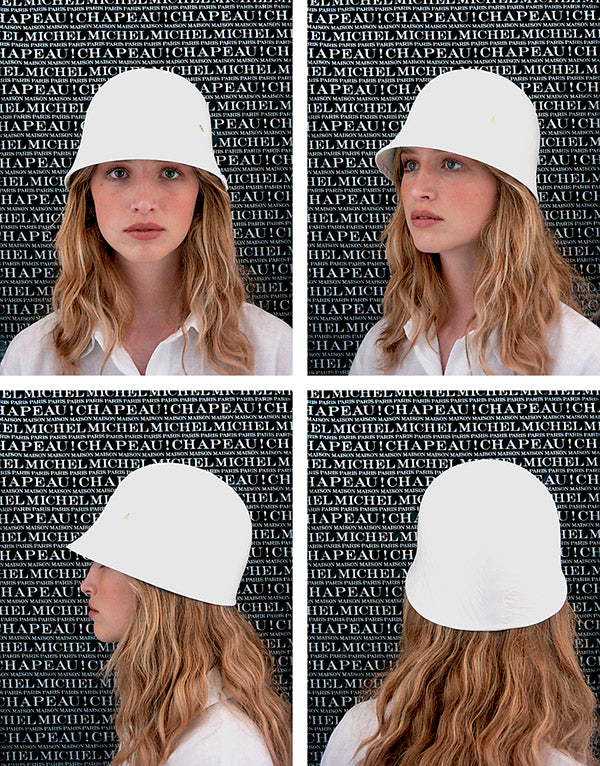 Octavie - Chapeau cloche avec un tendu de tissu blanc sur feutre.