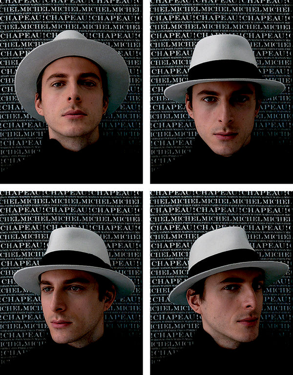 André - Fedora en feutre de laine gris orné d’un ruban noir.