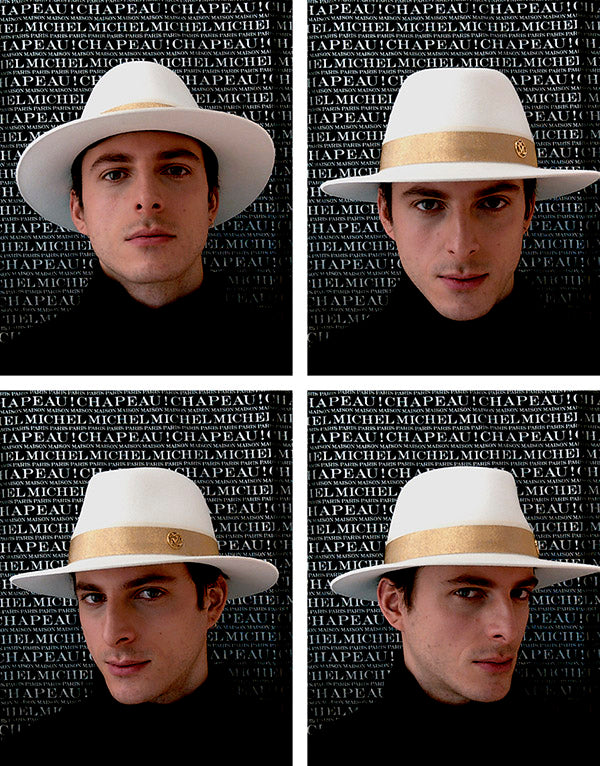 André - Fedora en feutre de laine blanc orné d’un ruban doré.