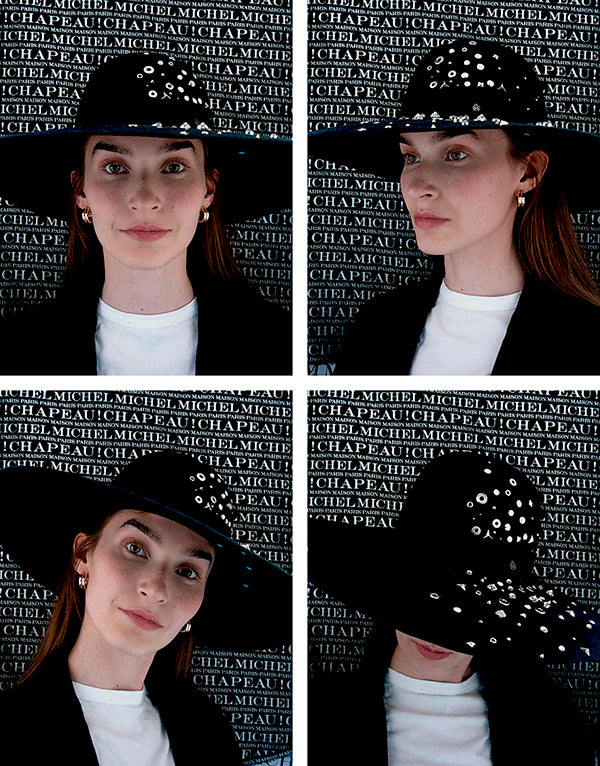 Blanche - Capeline en feutre bleu marine avec clous et strass effet poussière d'étoile.