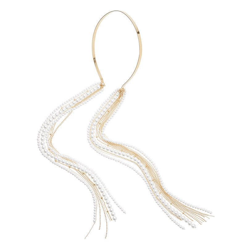 Dorothée - Serre-tête en métal doré avec pendentif à perles à porter derrière les oreilles.