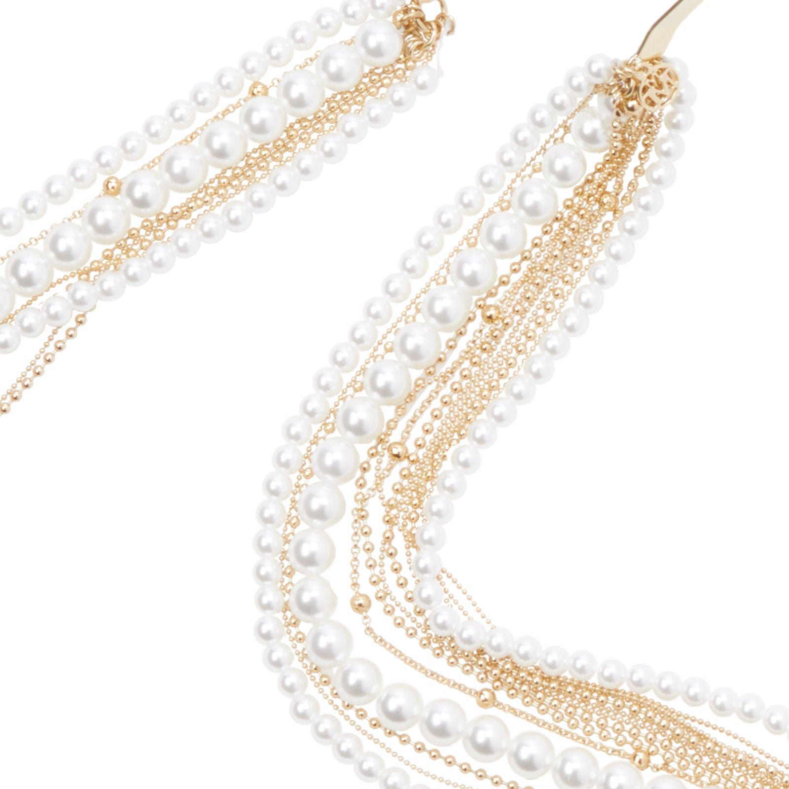 Dorothée - Serre-tête en métal doré avec pendentif à perles à porter derrière les oreilles.