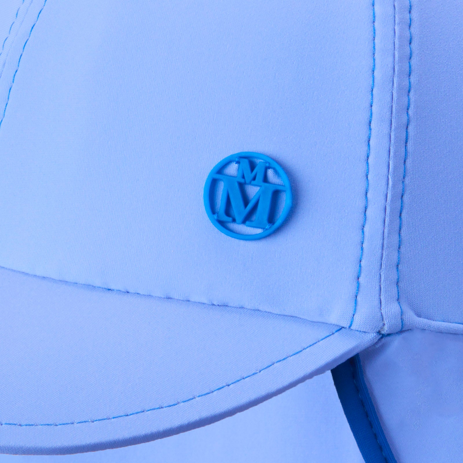 Gabin - Casquette en lycra bleue, résiste à l'eau et protège des UV.