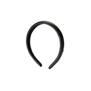 Hattaway - Accessoire de tête en cuir noir.