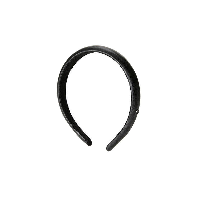 Hattaway - Accessoire de tête en cuir noir.