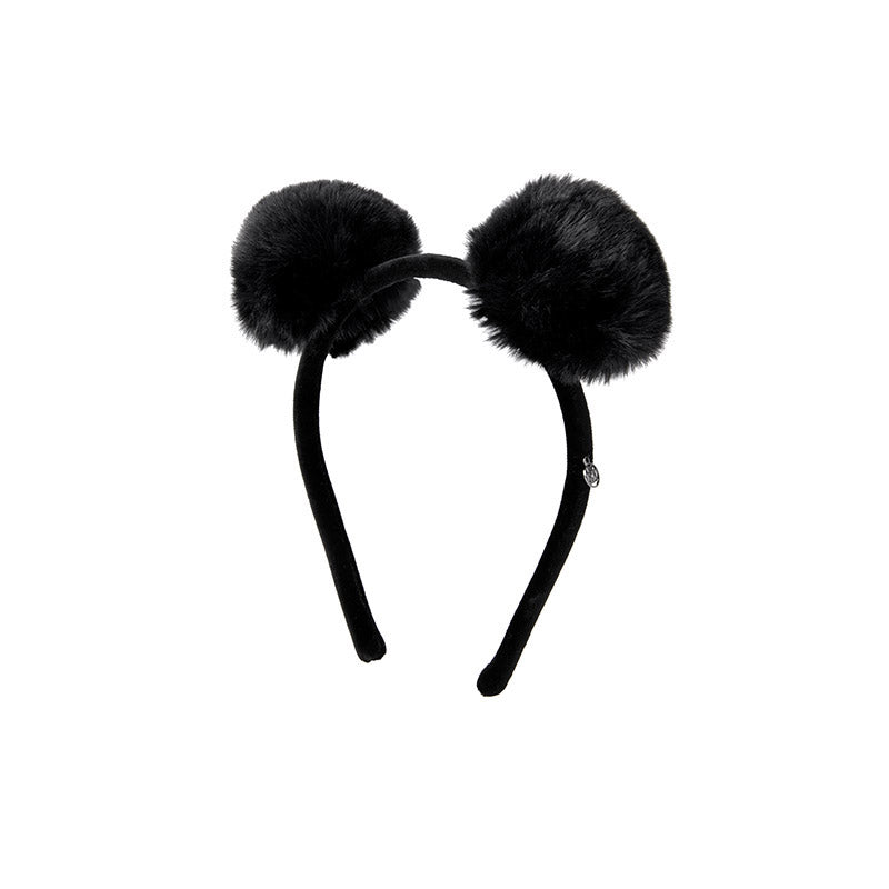 Heidi - Accessoire de tête en fausse fourrure noire.