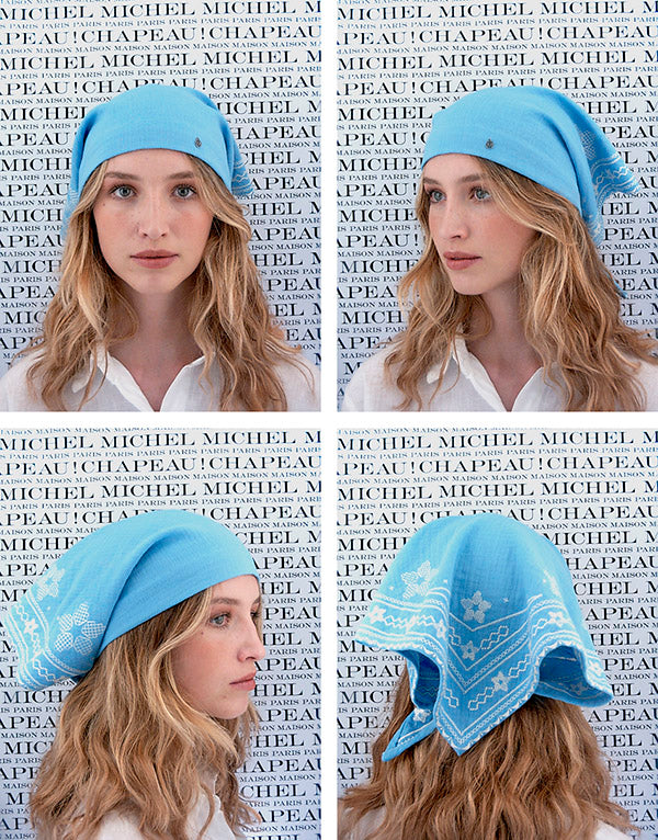 Ines - Turban en gaze de coton bleu avec des broderies blanches.