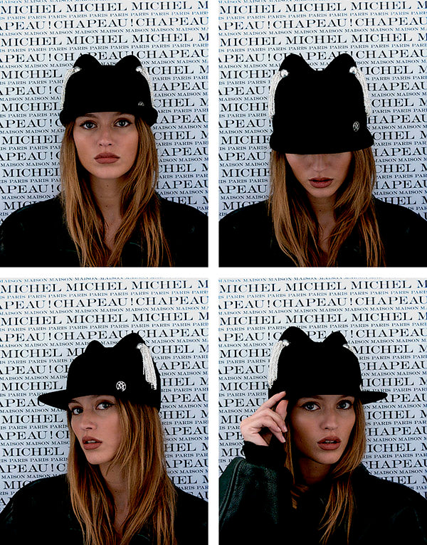 Jamie - Casquette en feutre de laine noir ornée d’oreilles de chat et de pampilles.