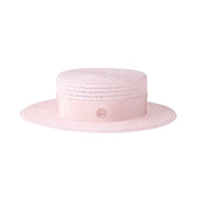 Kiki - Canotier en paille rose orné d’un ruban ton sur ton.