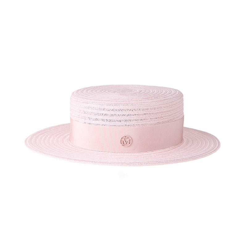 Kiki - Canotier en paille rose orné d’un ruban ton sur ton.