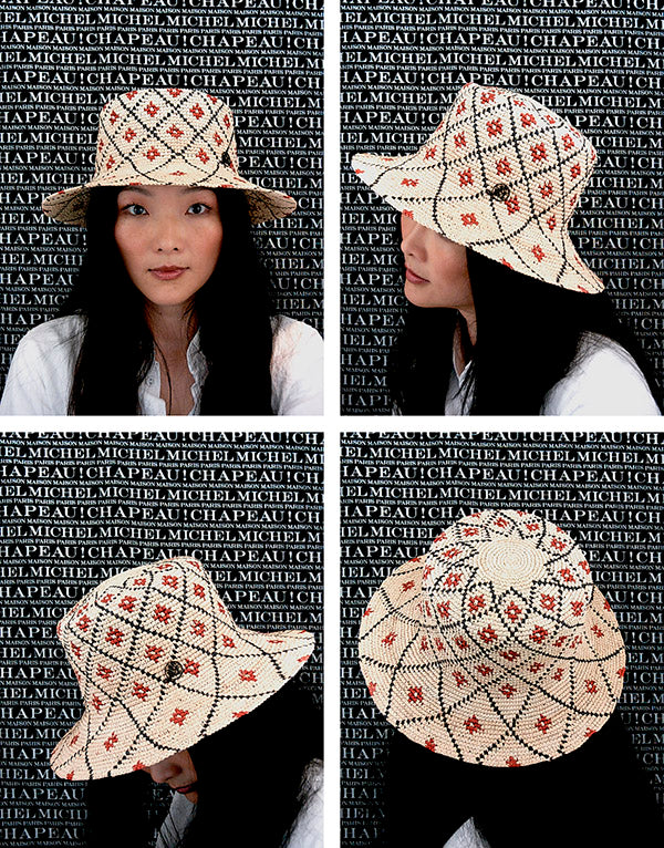 Ludi - Chapeau en paille de raphia crochetée à la main avec des motifs floraux.
