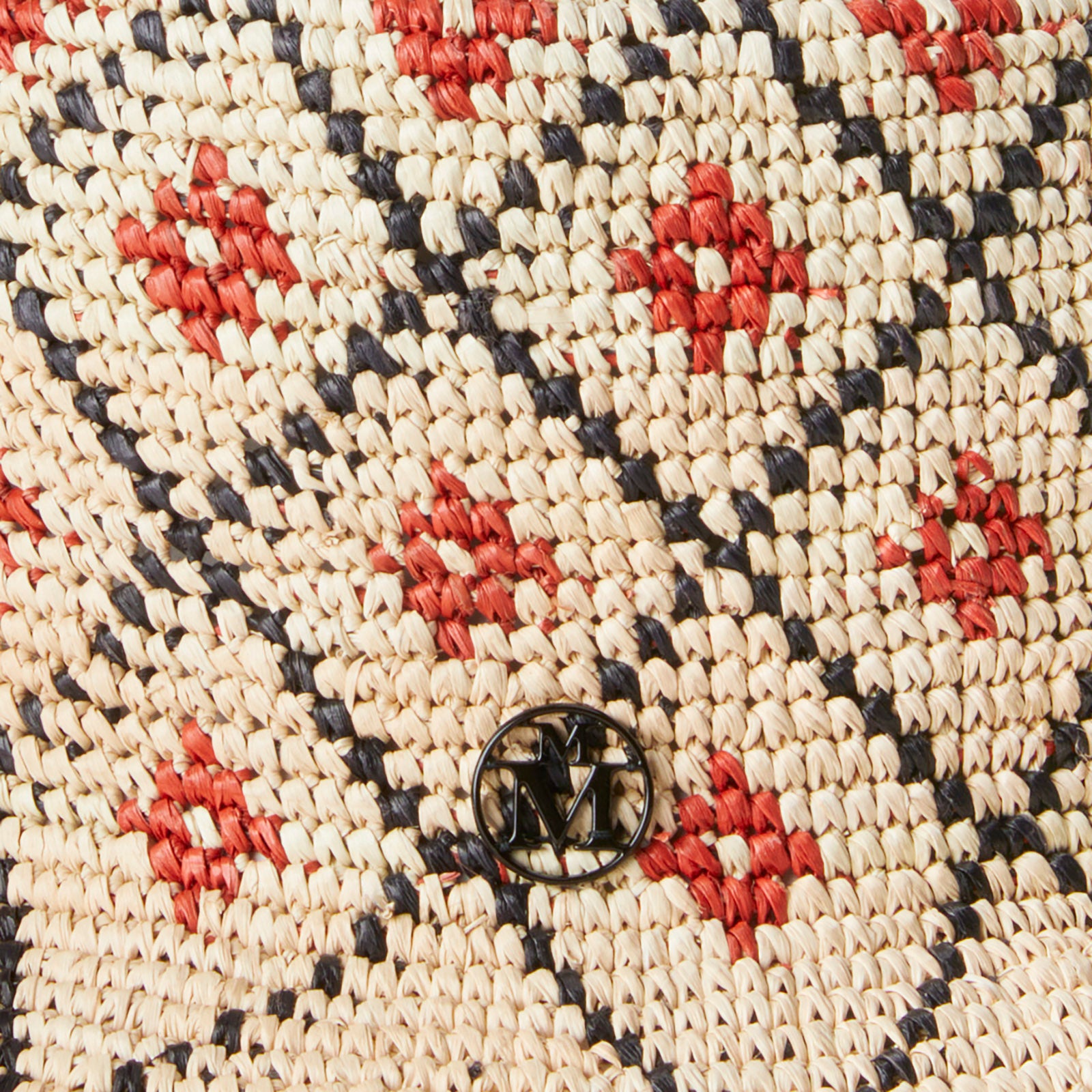 Ludi - Chapeau en paille de raphia crochetée à la main avec des motifs floraux.