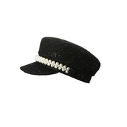 New Abby - Casquette en tweed noir orné de sequins et d’un rang de perles.