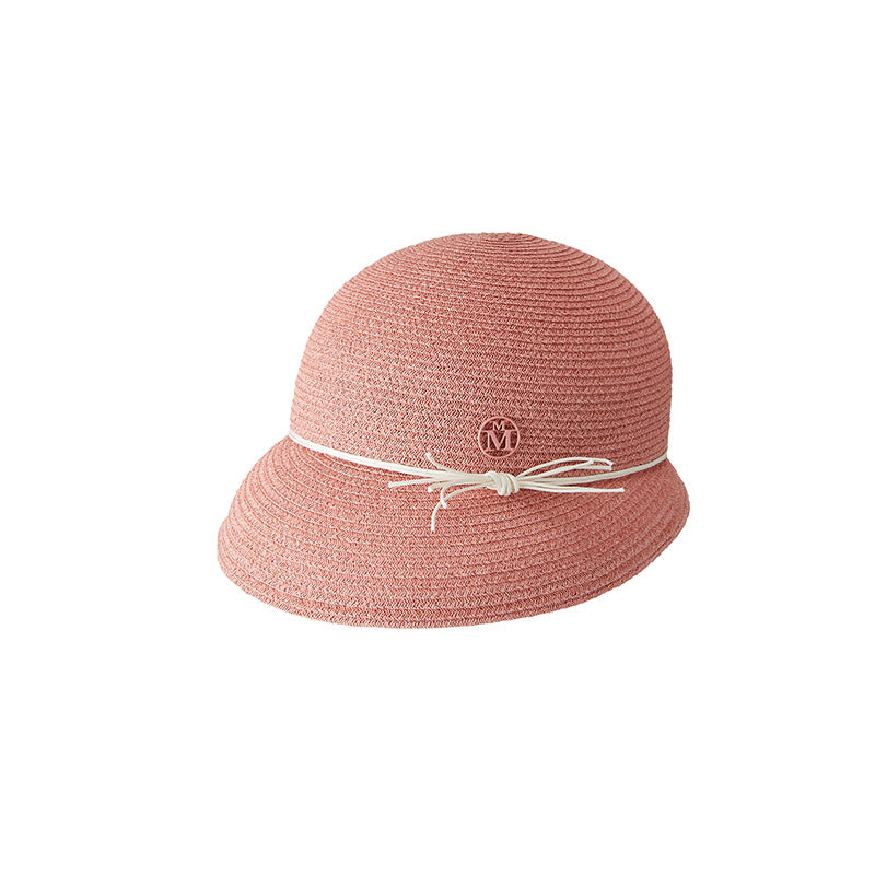 Patty - visière en paille rose pour enfant.