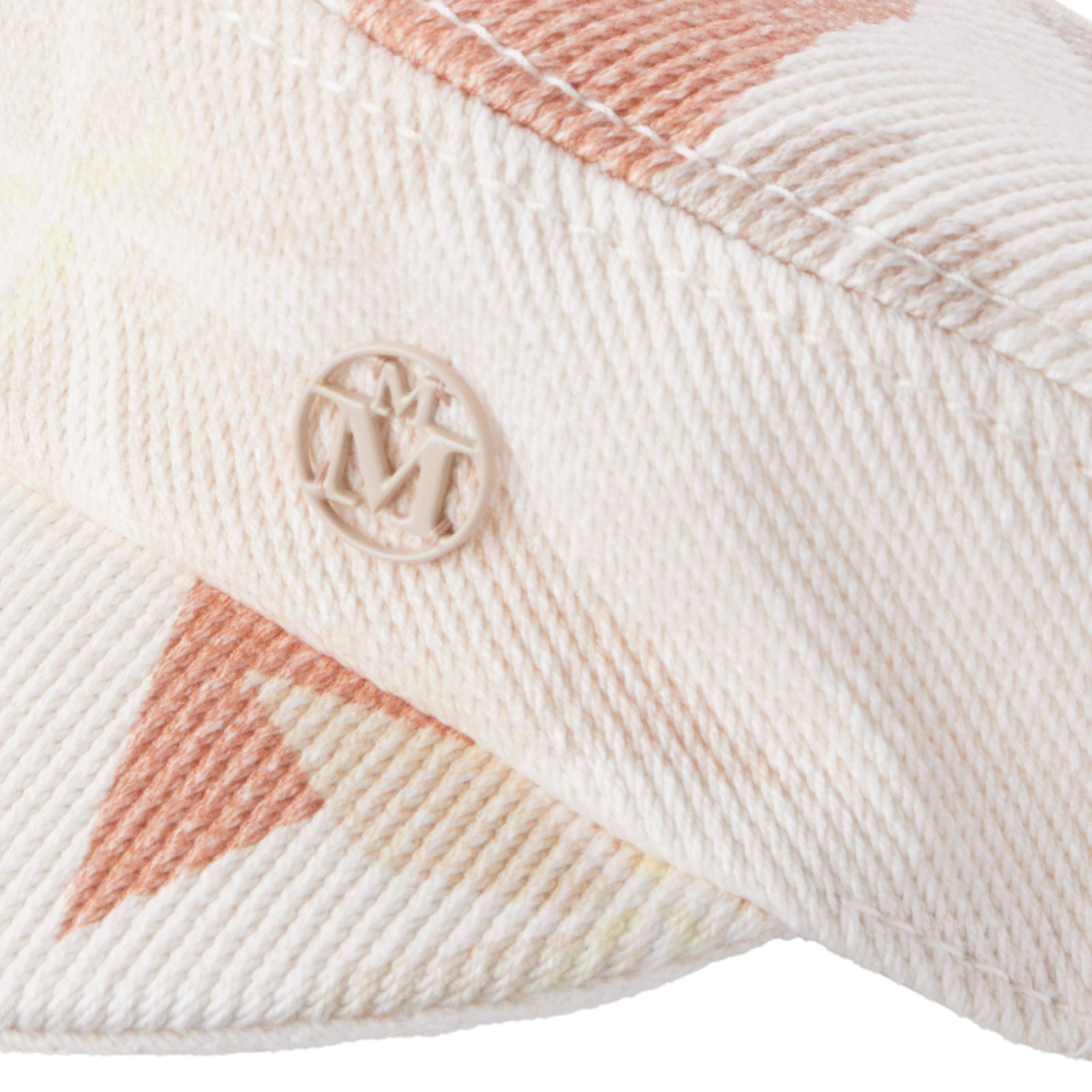 Peneloppe - Casquette en tissu imprimé multicolore inspiré par la fleur d'oranger.