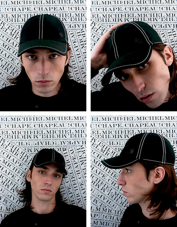 Tiger - Casquette en coton noir avec des coutures blanches.