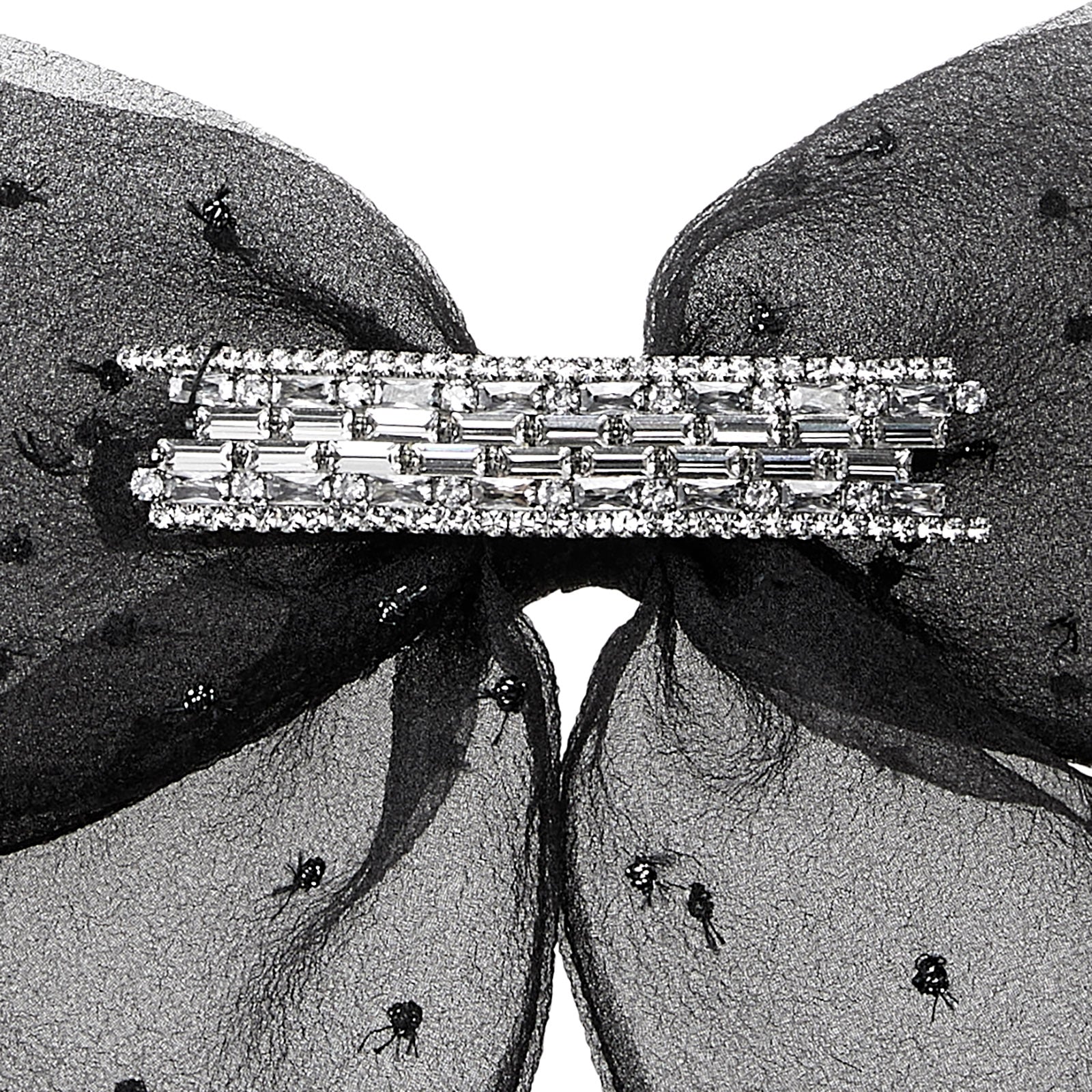 Willa - Noeud fait en organza noir avec des plumetis argentés et des strass.