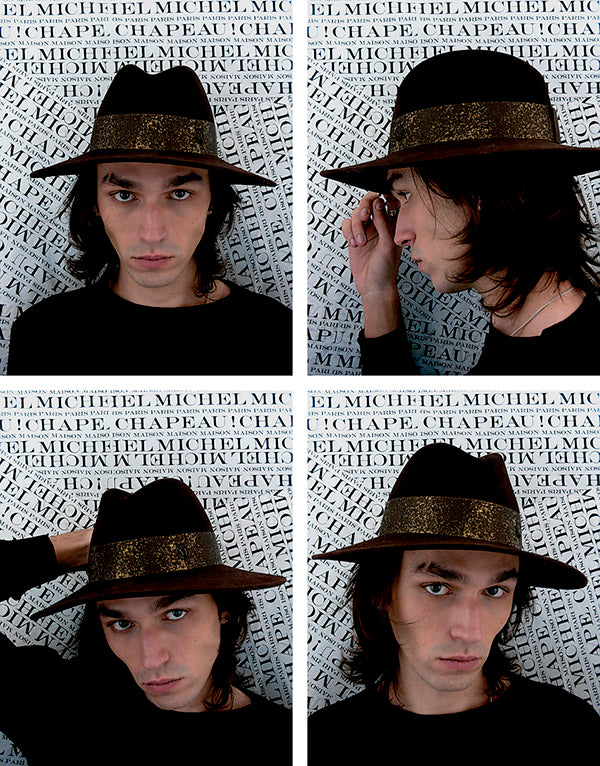 Zango - Fedora en feutre marron foncé avec un ruban marron et doré.