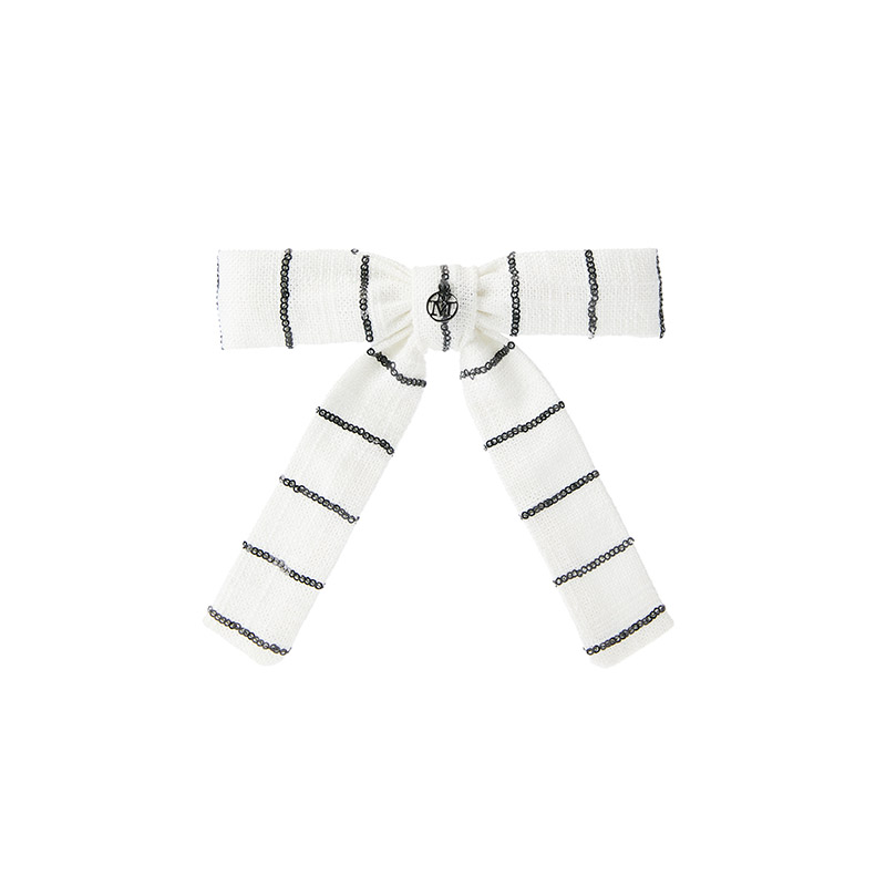 Bow with black and white stripes sequins on linen