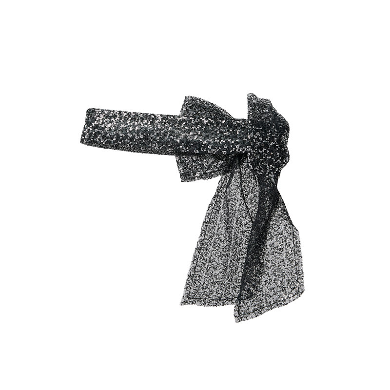 Headband in black fabric with a big bow in silver starlight sequins