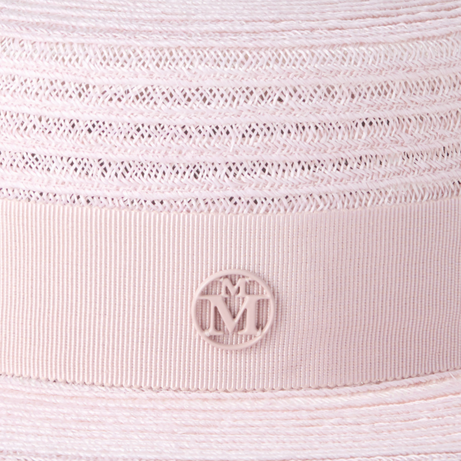 Boater hat in pink straw embellished with a tone on tone ribbon