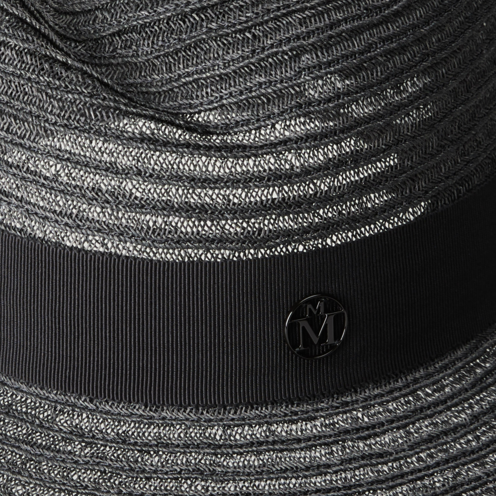 Fedora hat in grey straw embellished with a tone on tone ribbon